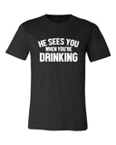 HE SEES YOU WHEN YOU'RE DRINKING BOUTIQUE TEE